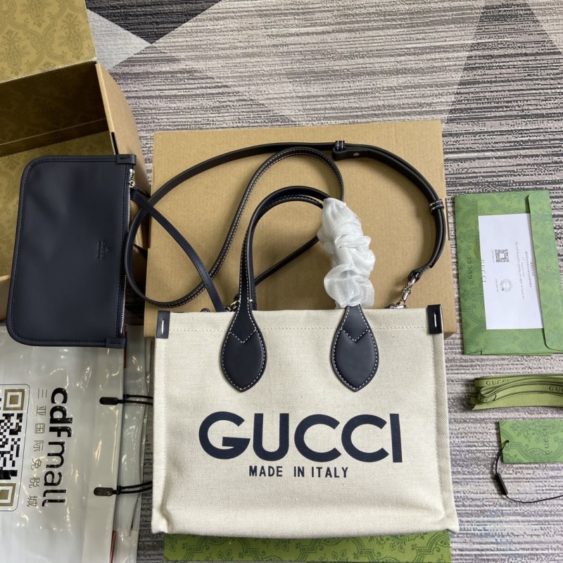 G*u*i shopping bags